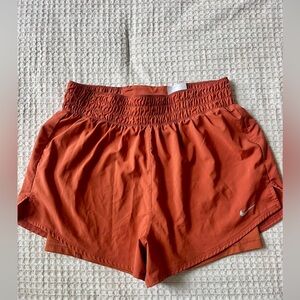 Nike rust orange small shorts